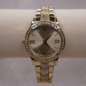 Elegant Women's Gold Watch with Diamond Accents